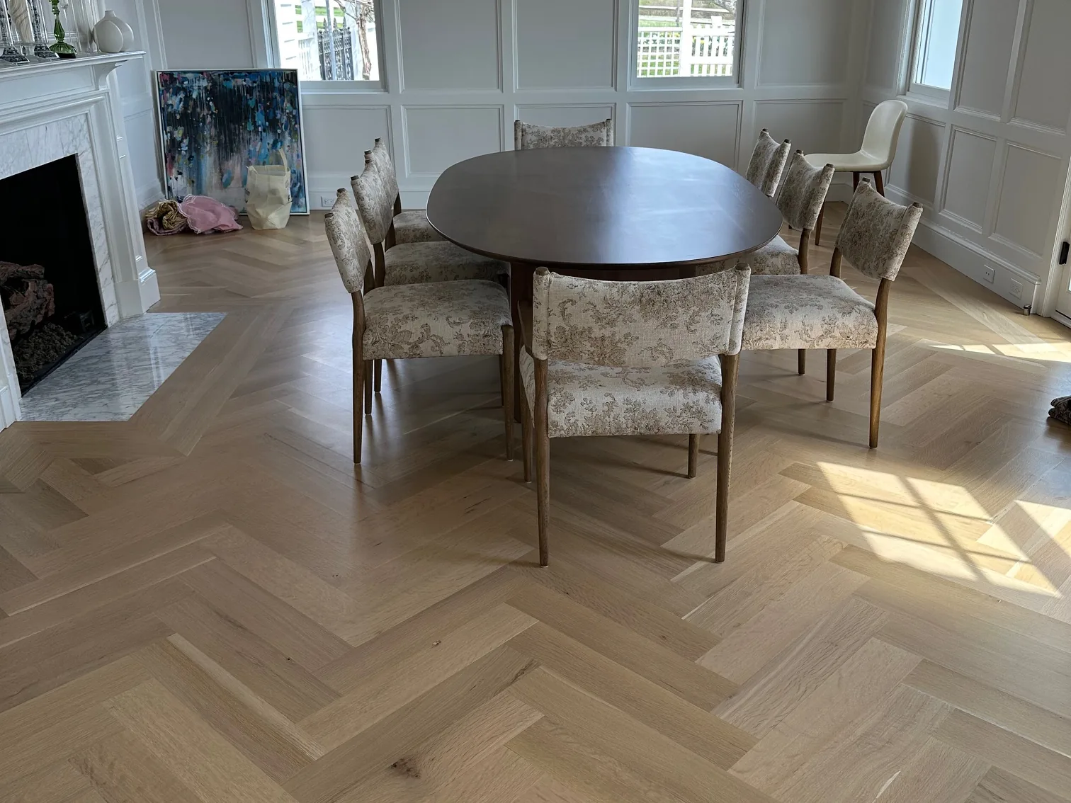White oak herringbone floor installed in a New Jersey dining room