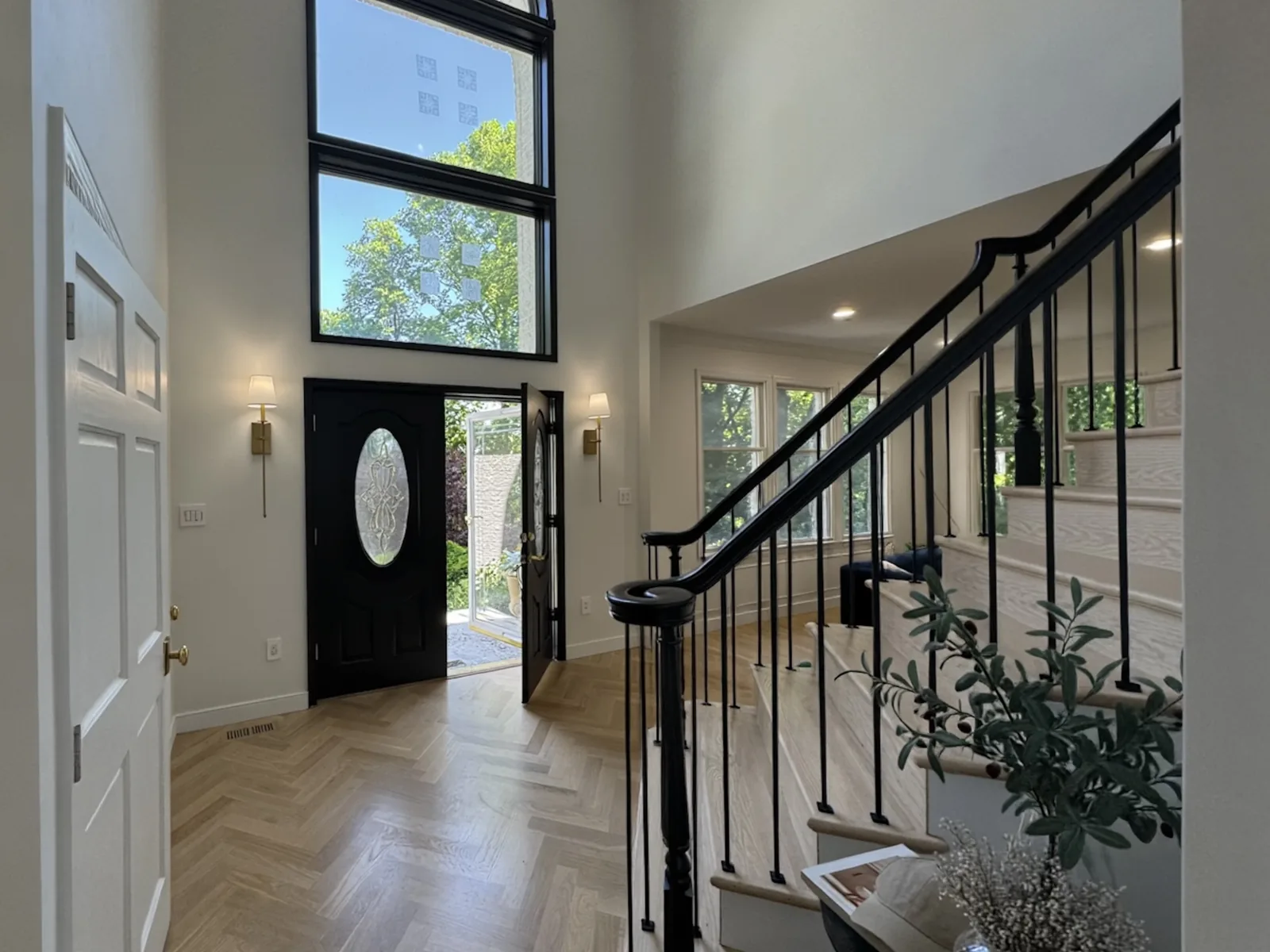 Herringbone hardwood floor in a two-storey entryway in Atlantic Highlands NJ