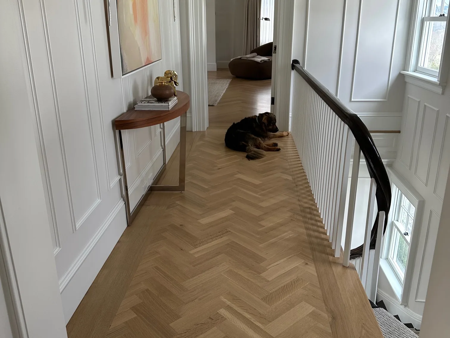 Herringbone hardwood floor on an upstairs landing in a New Jersey home